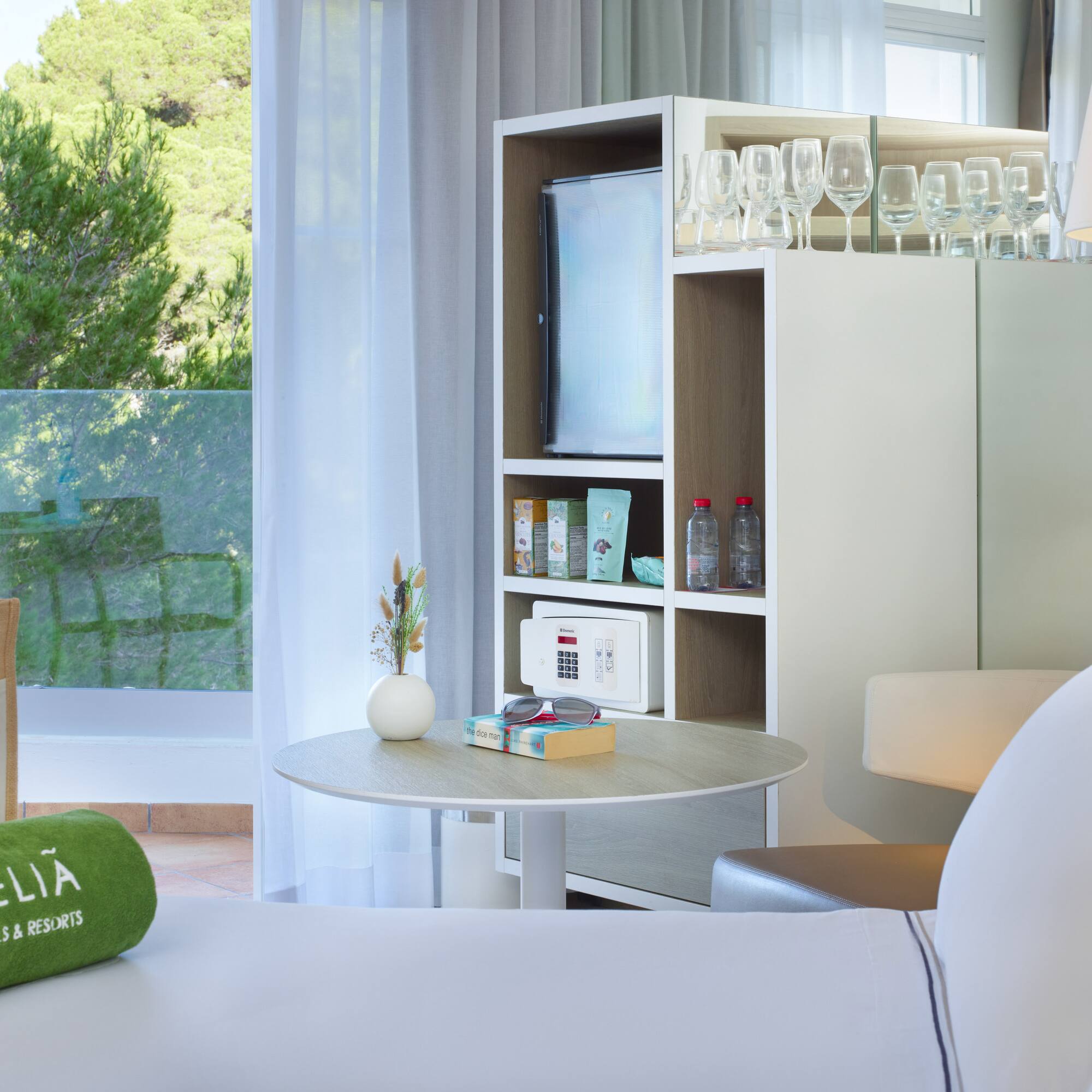 a room with a television and a table