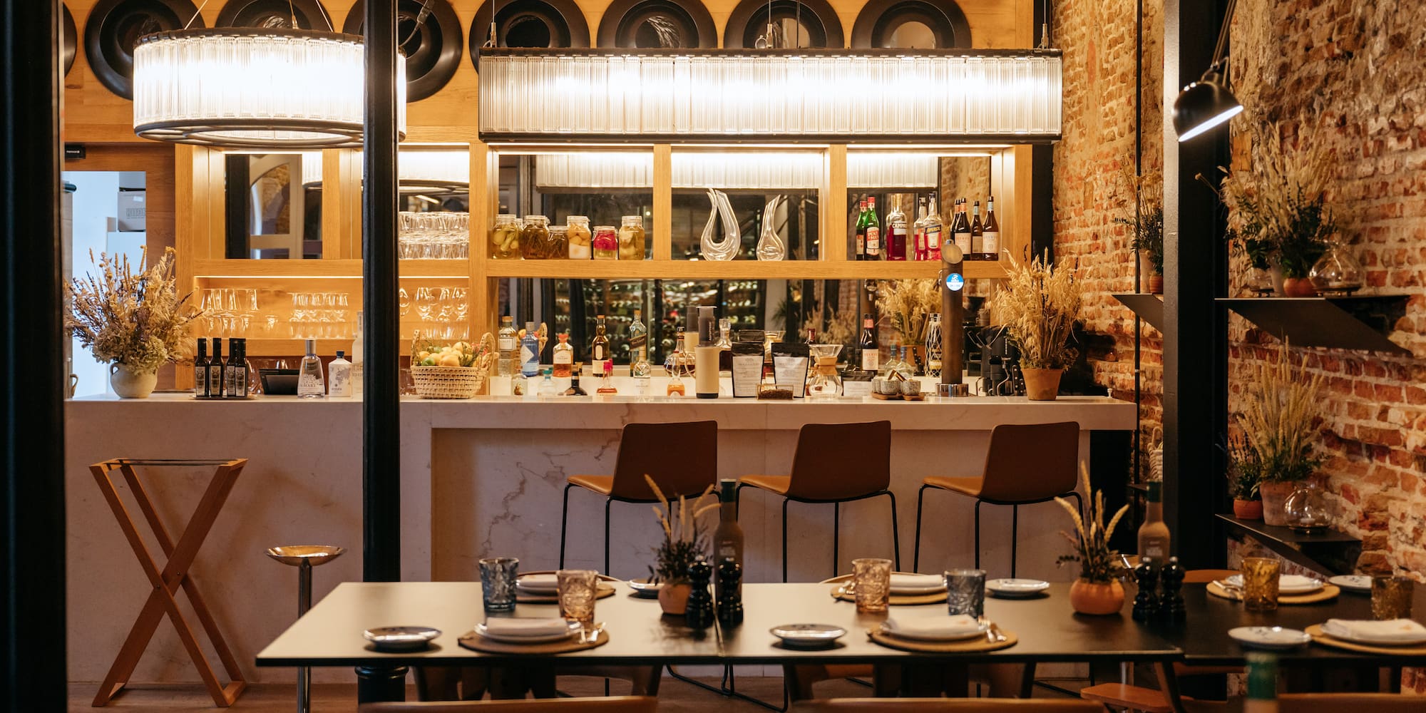 a restaurant with a bar and a table