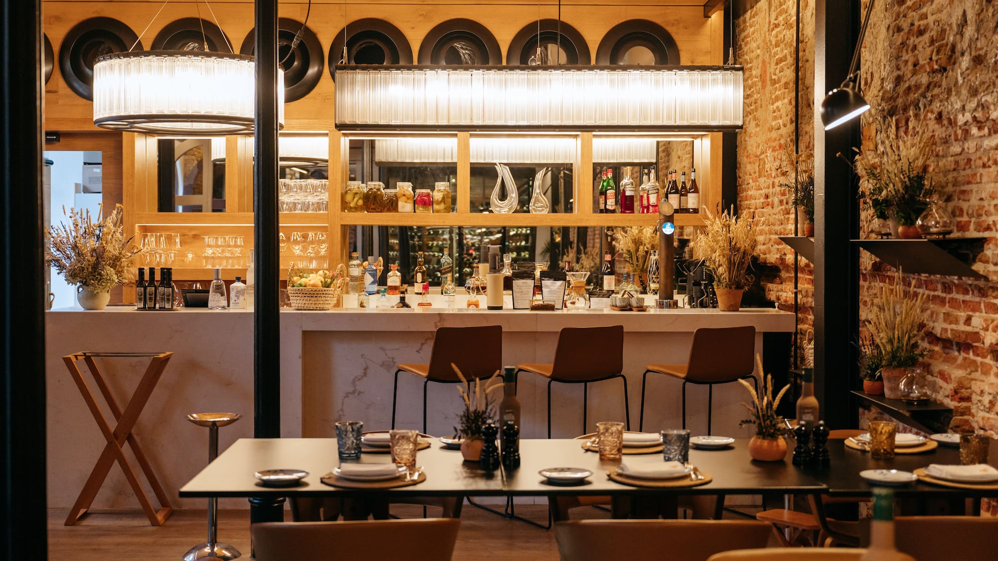 a restaurant with a bar and a table