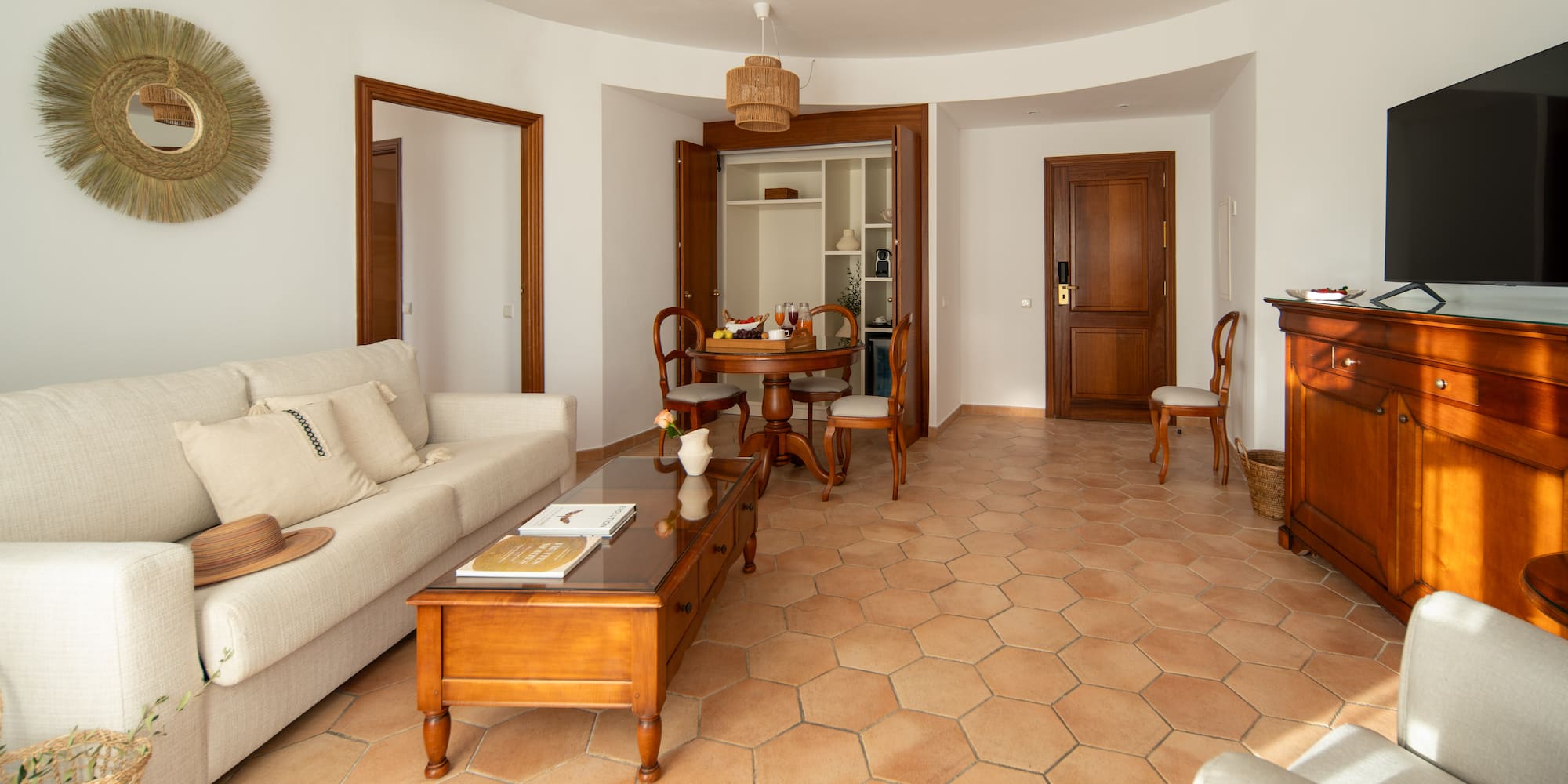 a living room with a couch and coffee table