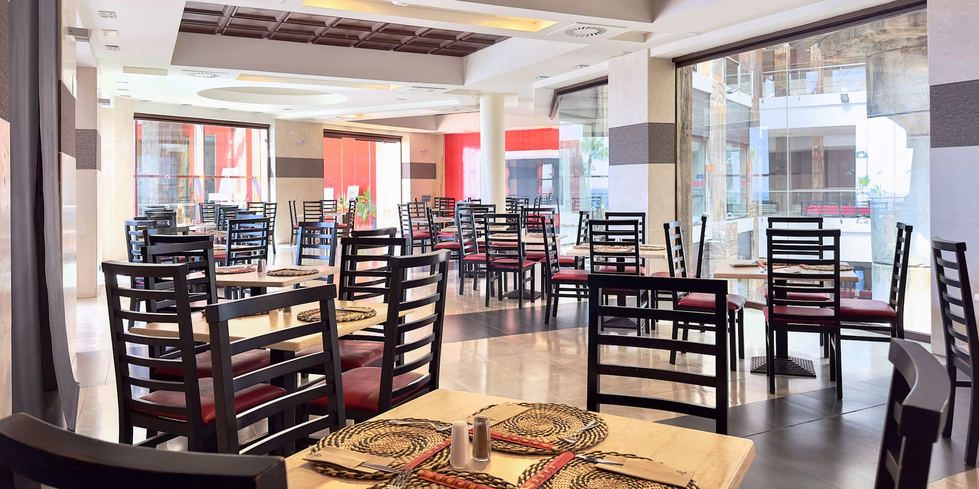 a room with tables and chairs