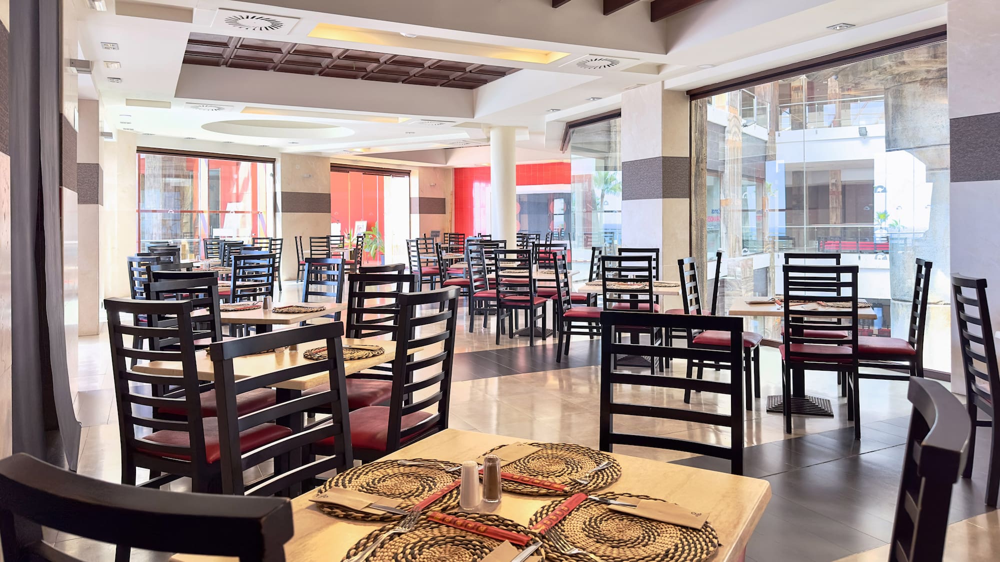 a room with tables and chairs