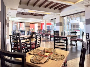 a room with tables and chairs