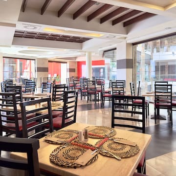 a room with tables and chairs