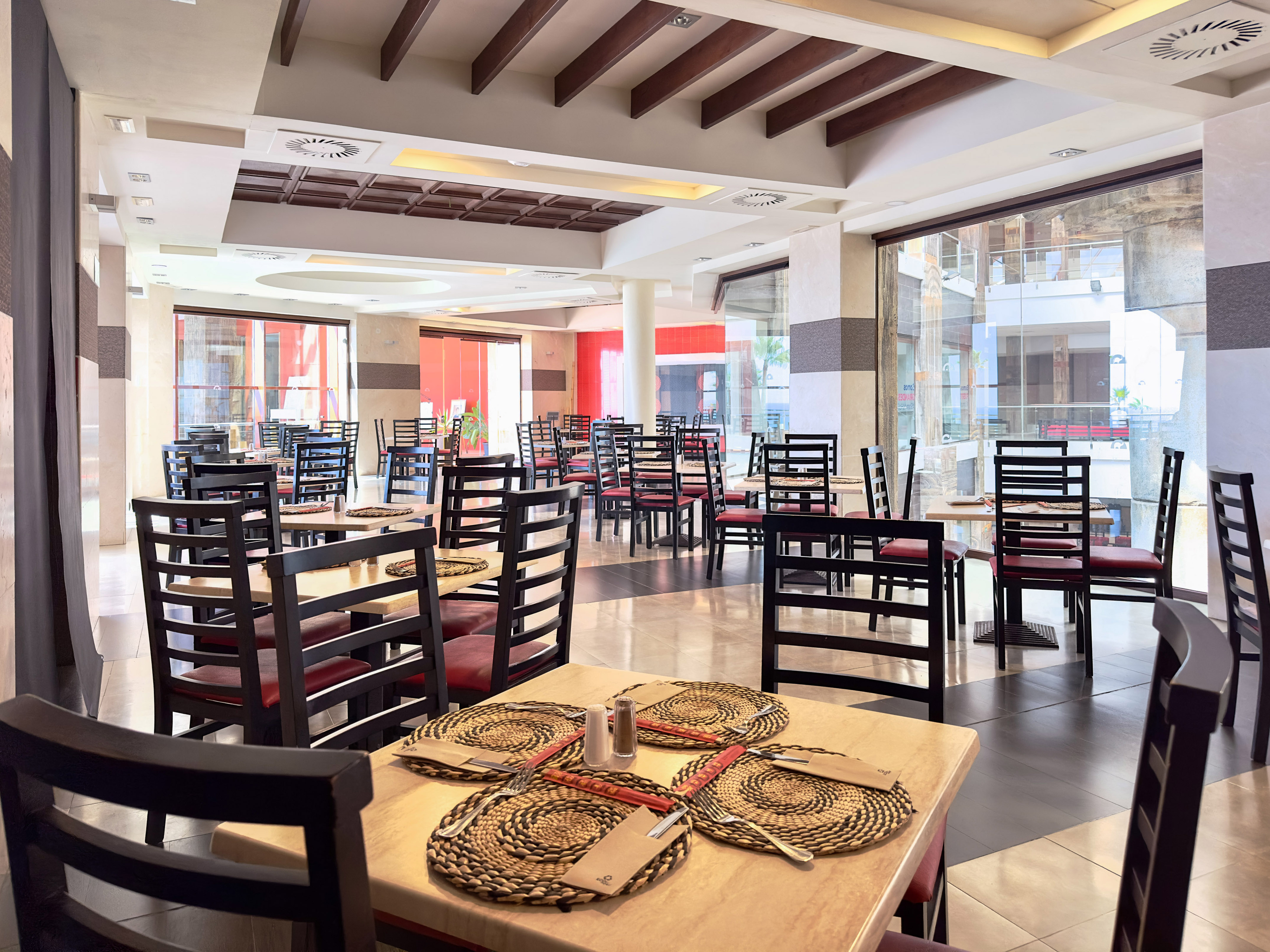 a room with tables and chairs