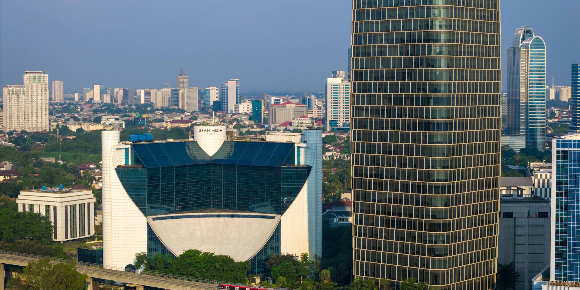 a train going over a city