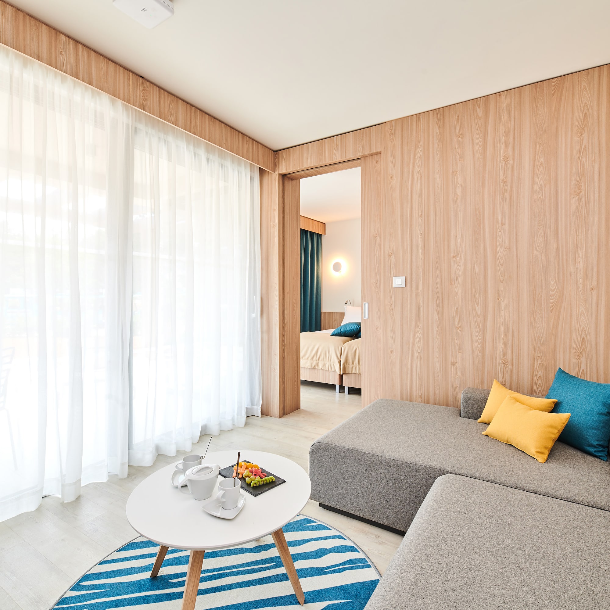 a room with a couch and a coffee table