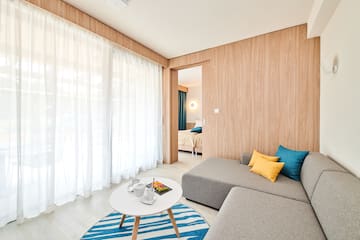 a room with a couch and a coffee table