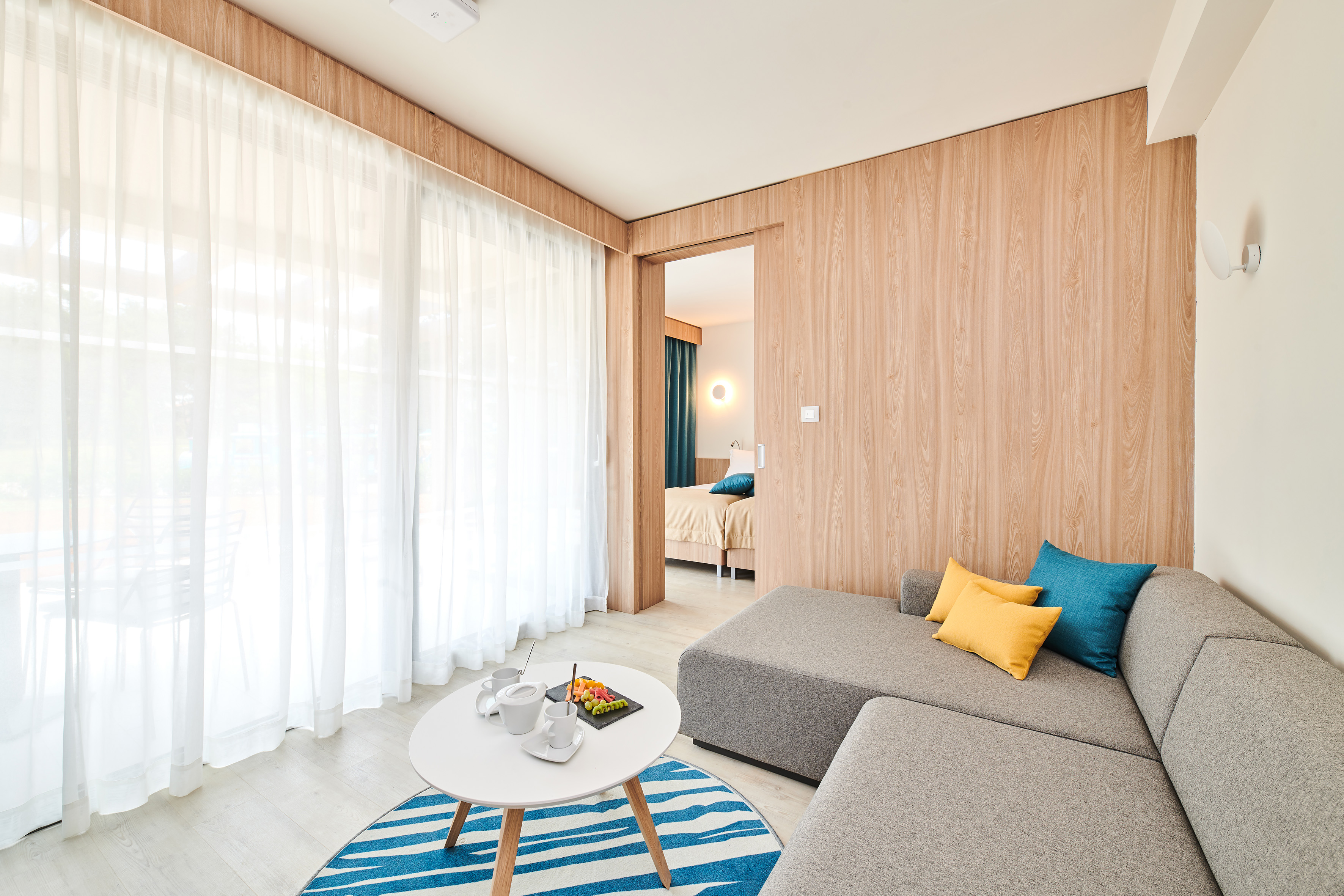 a room with a couch and a coffee table