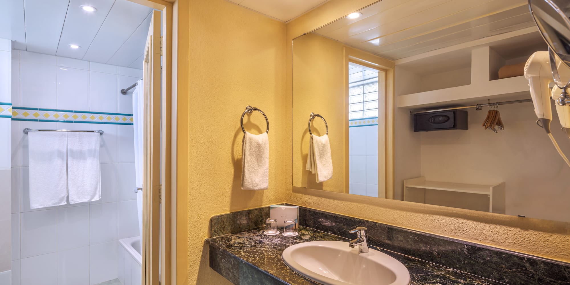 a bathroom with a sink and a shower