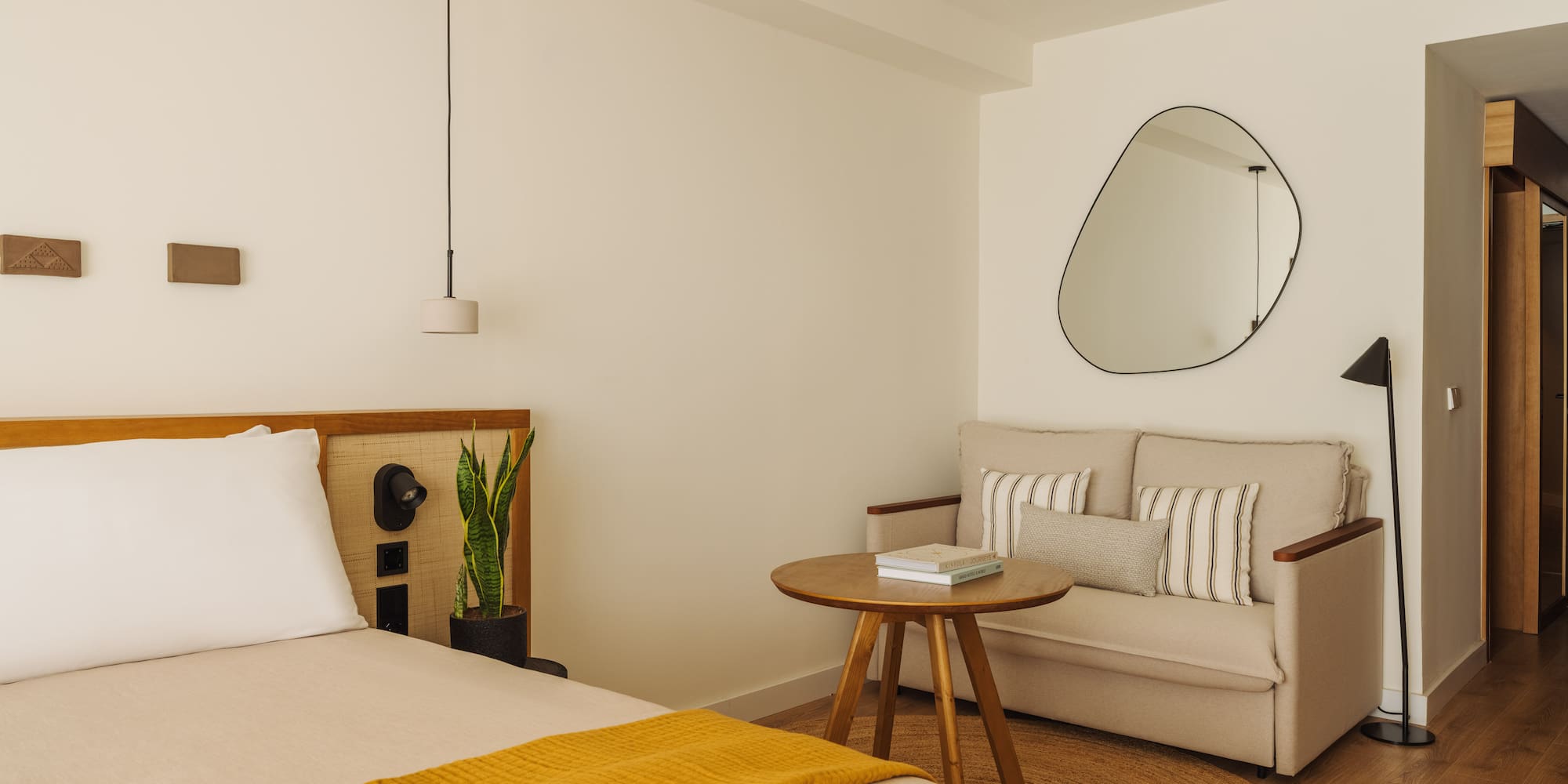 a room with a bed and a couch