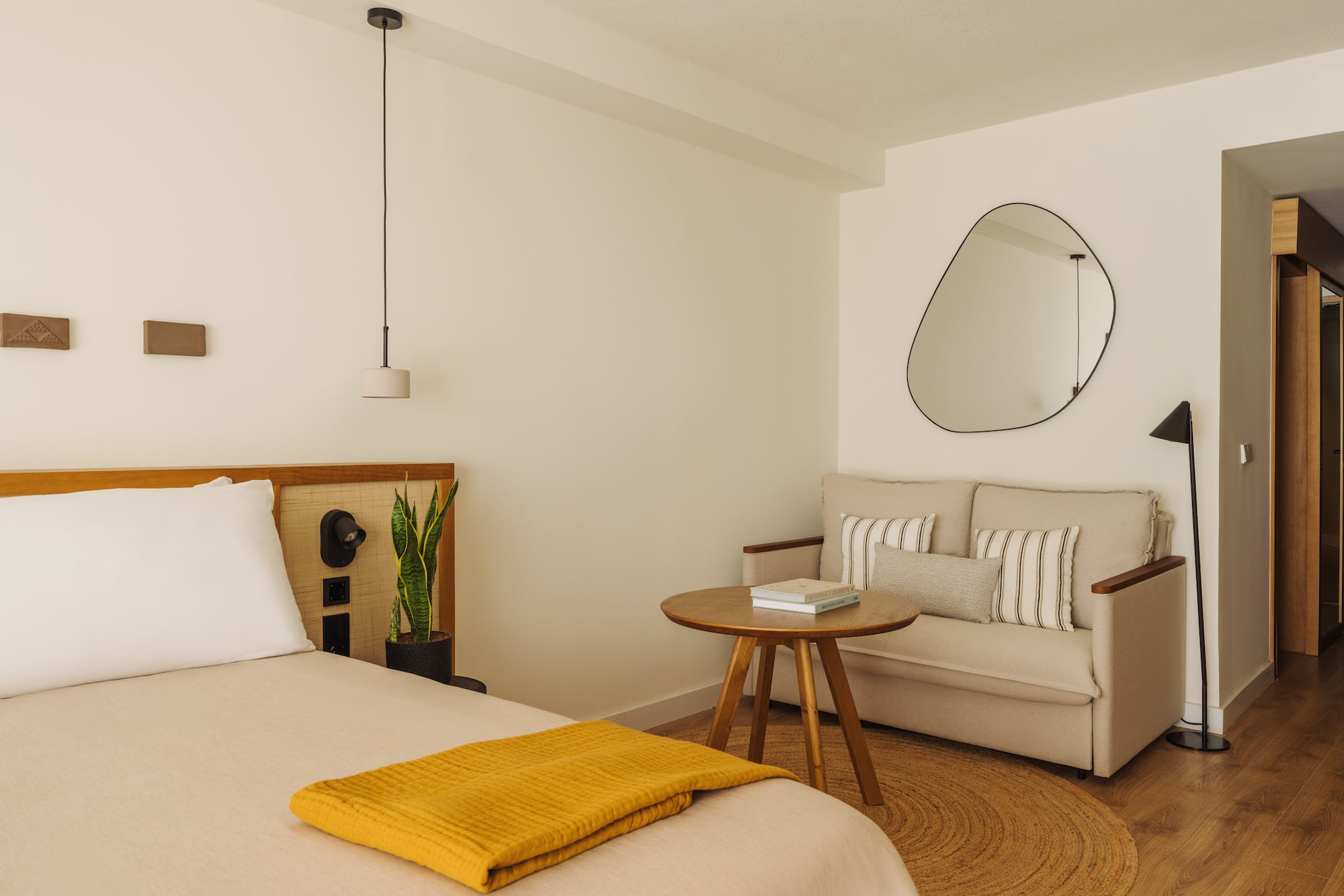 a room with a bed and a couch