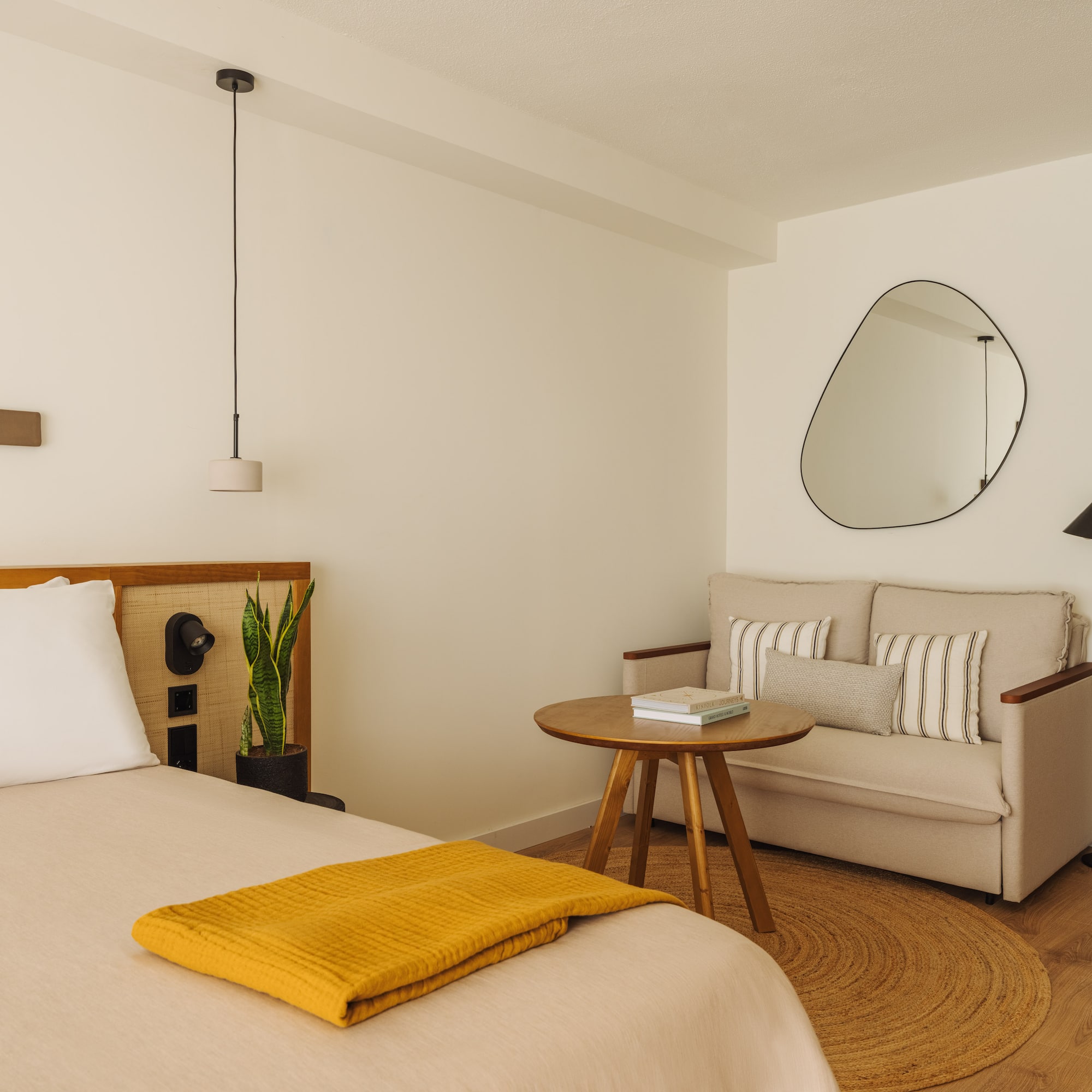 a room with a bed and a couch