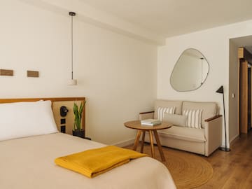 a room with a bed and a couch