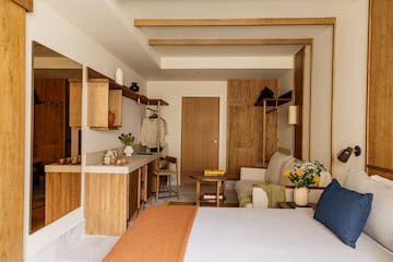 a room with a bed and a couch