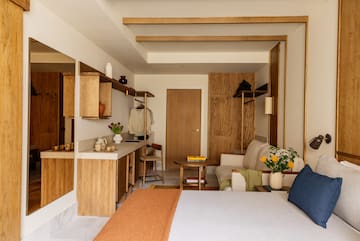 a room with a bed and a couch