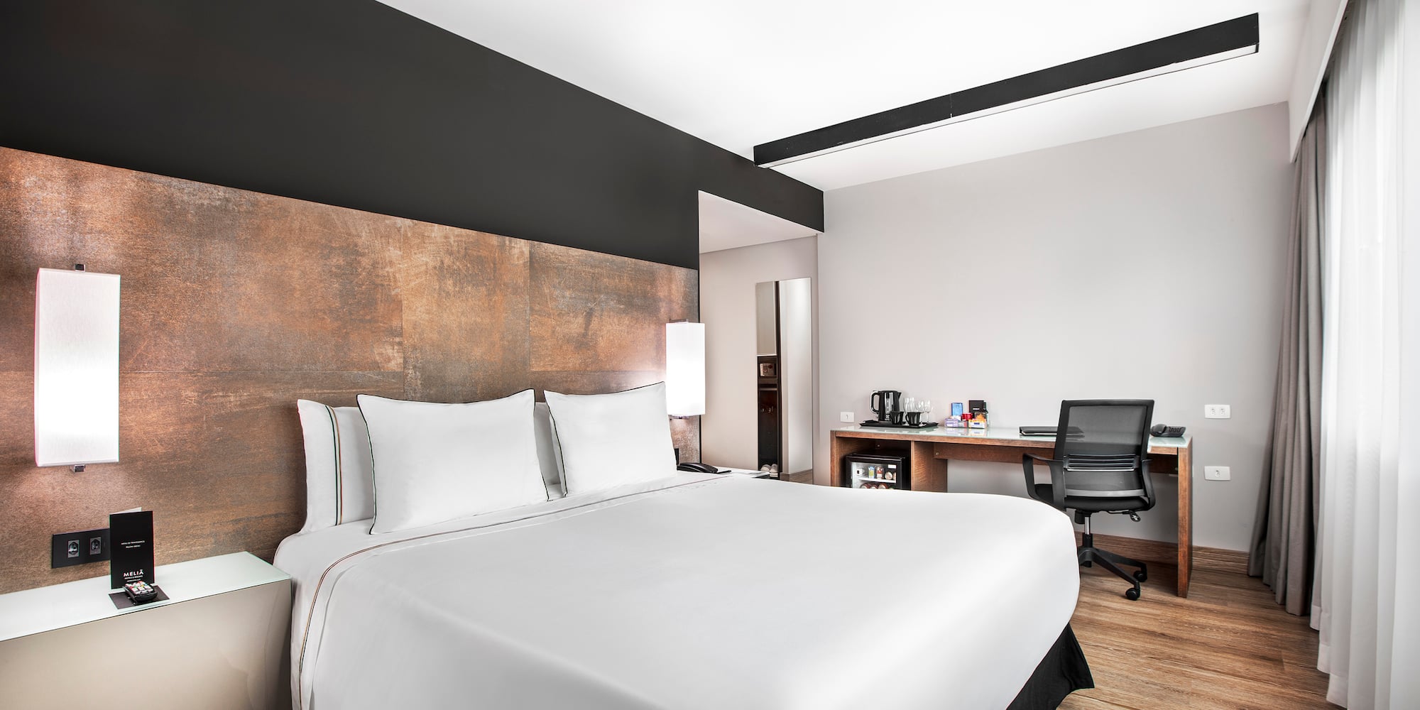 a bed in a hotel room