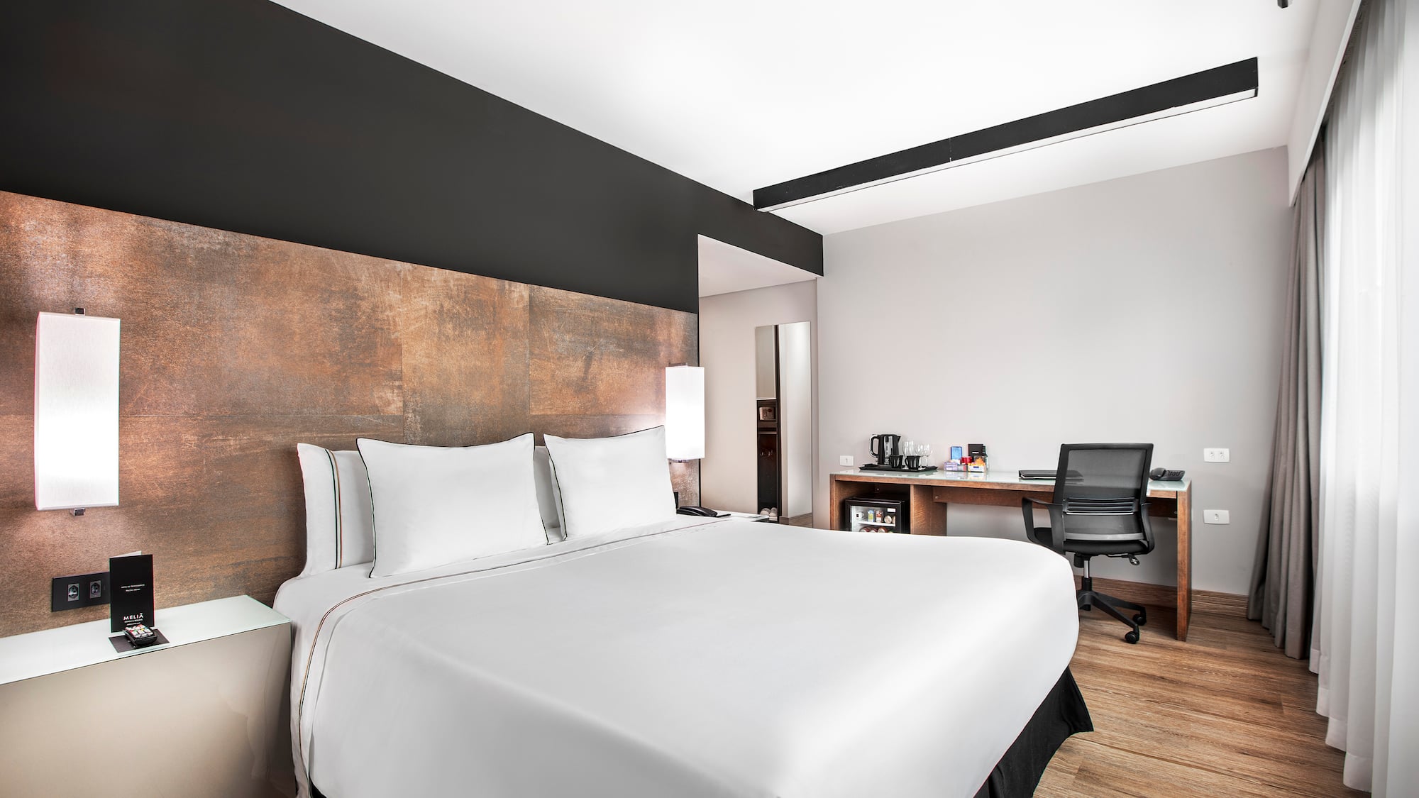 a bed in a hotel room