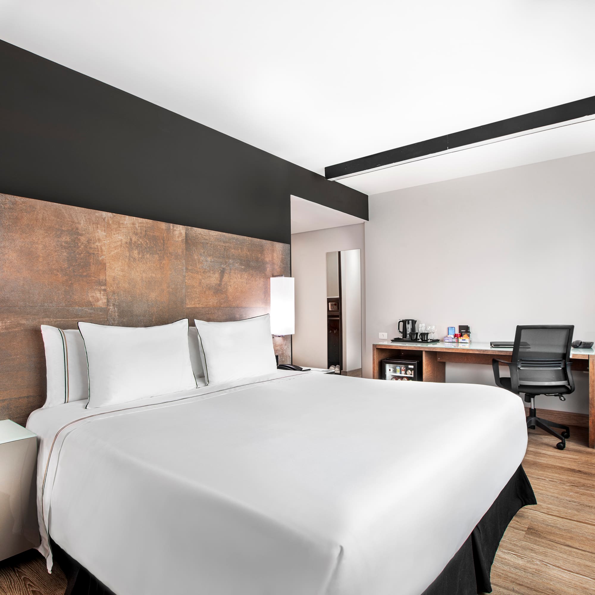 a bed in a hotel room