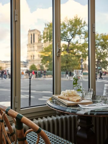 a table with food on it and a glass of water on it
