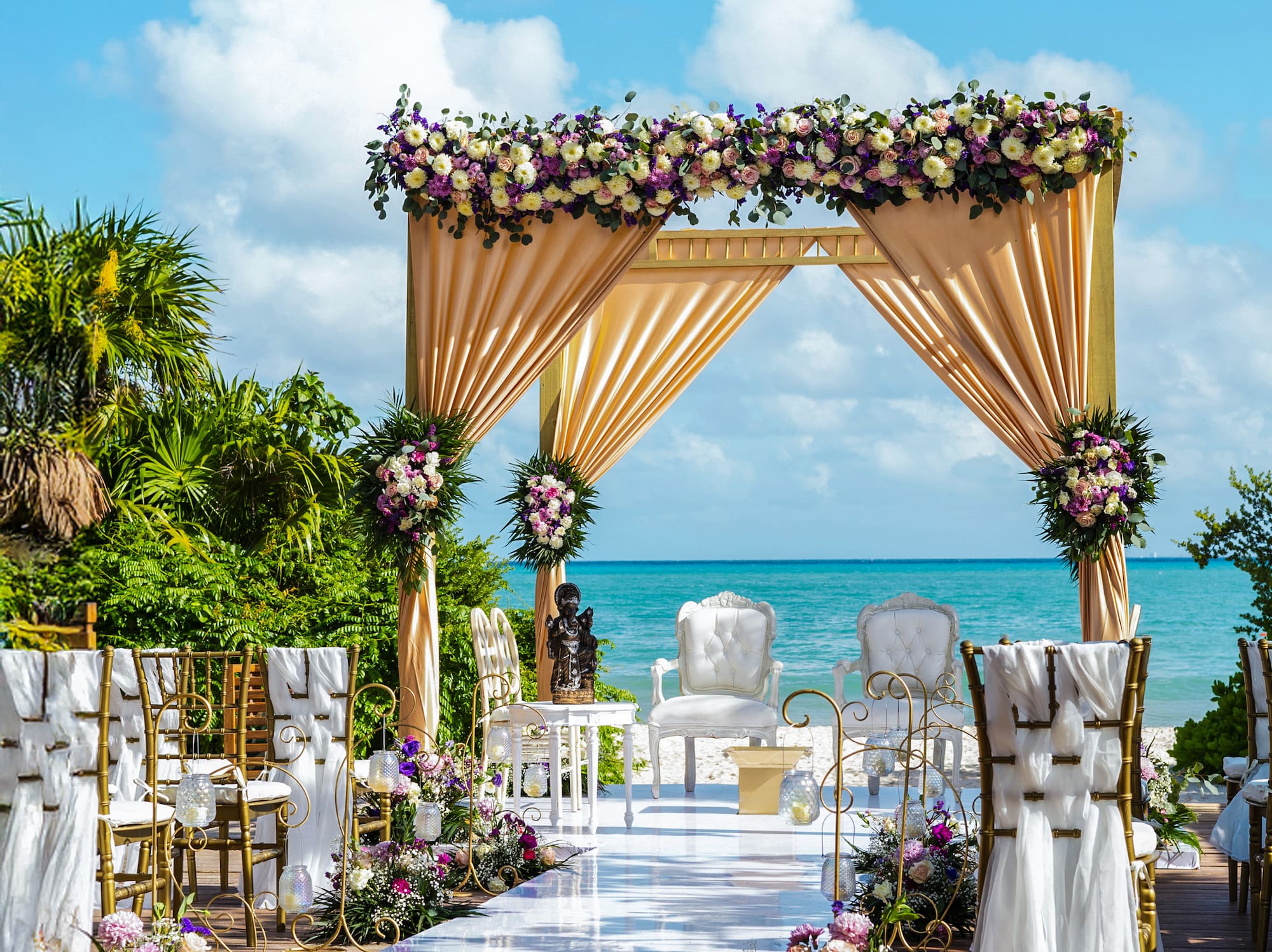 a wedding ceremony set up on a beach