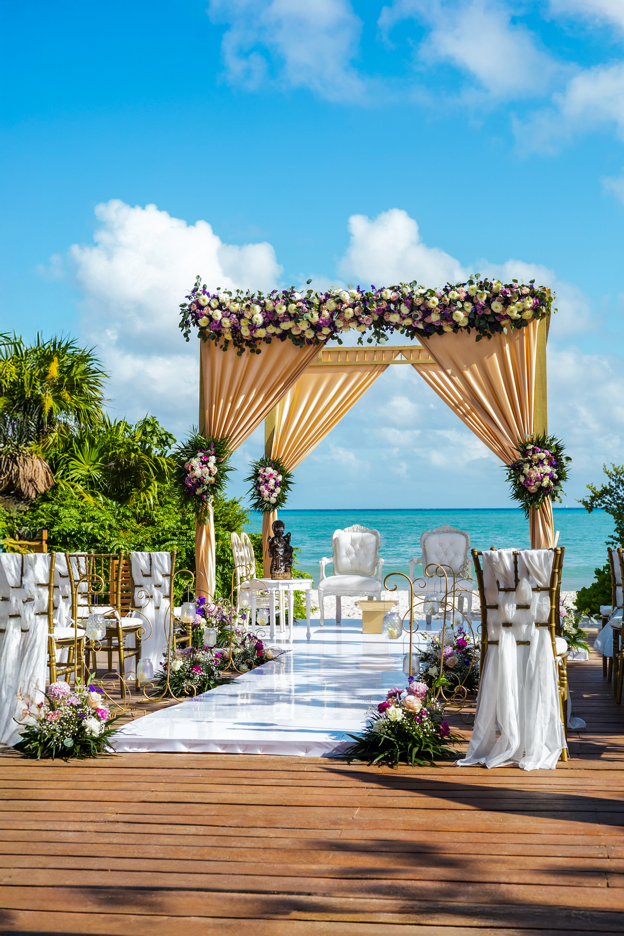 a wedding ceremony set up on a beach