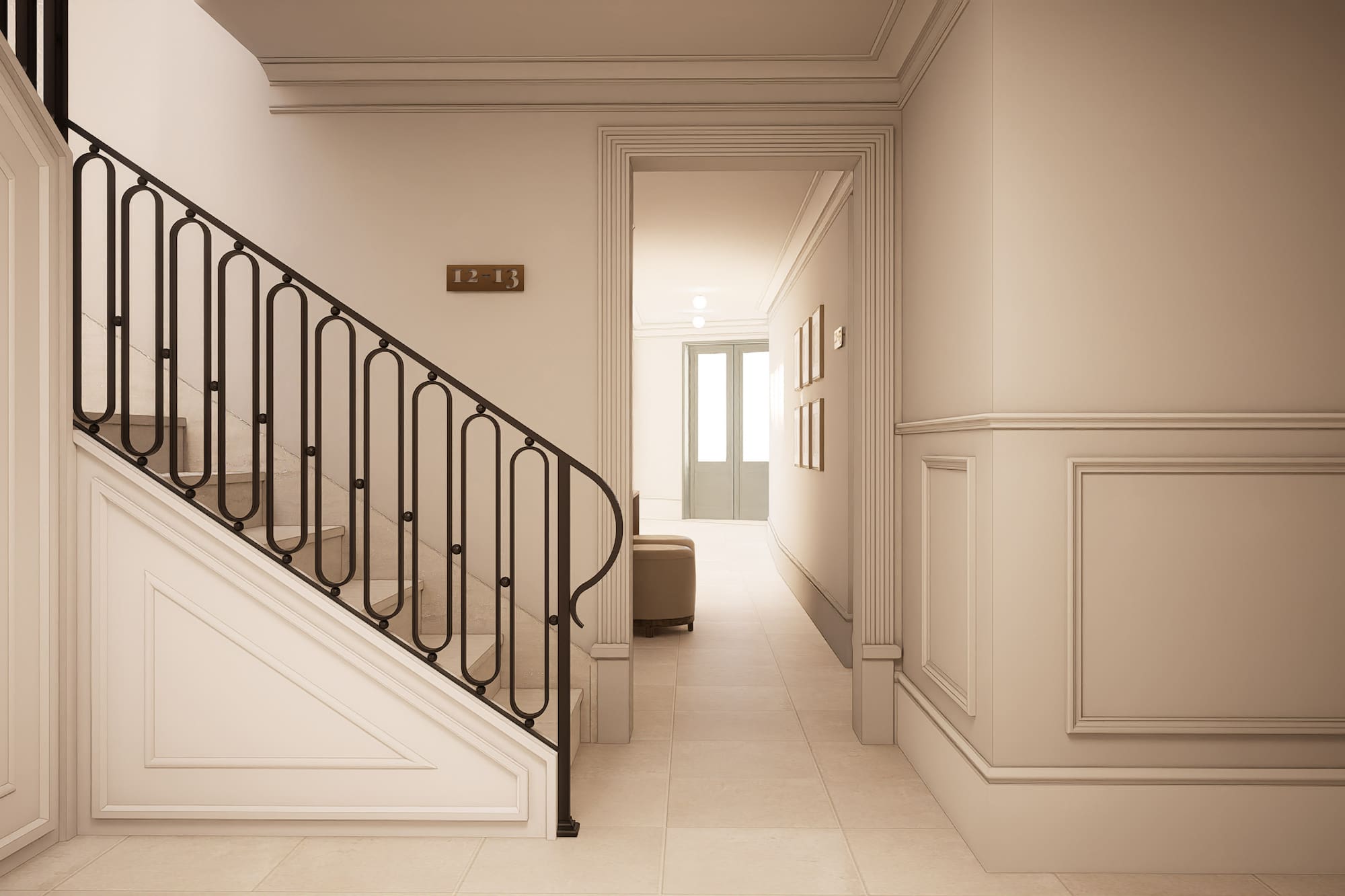 Elegant modern hallway with white staircase, black iron railing, and wainscoting.
