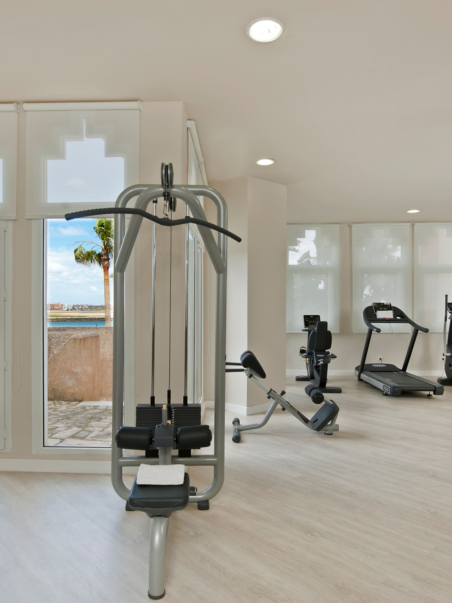 a large room with exercise equipment