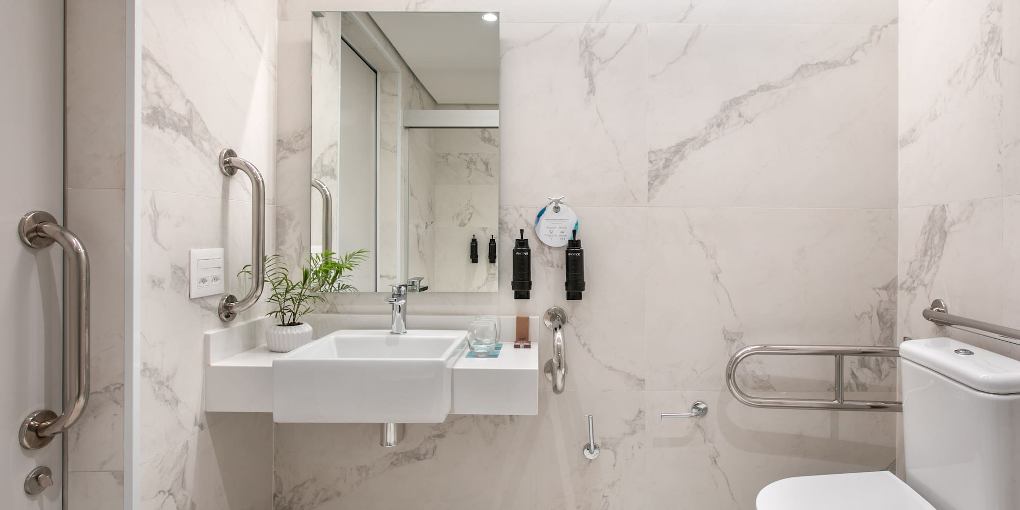 a bathroom with a sink and toilet