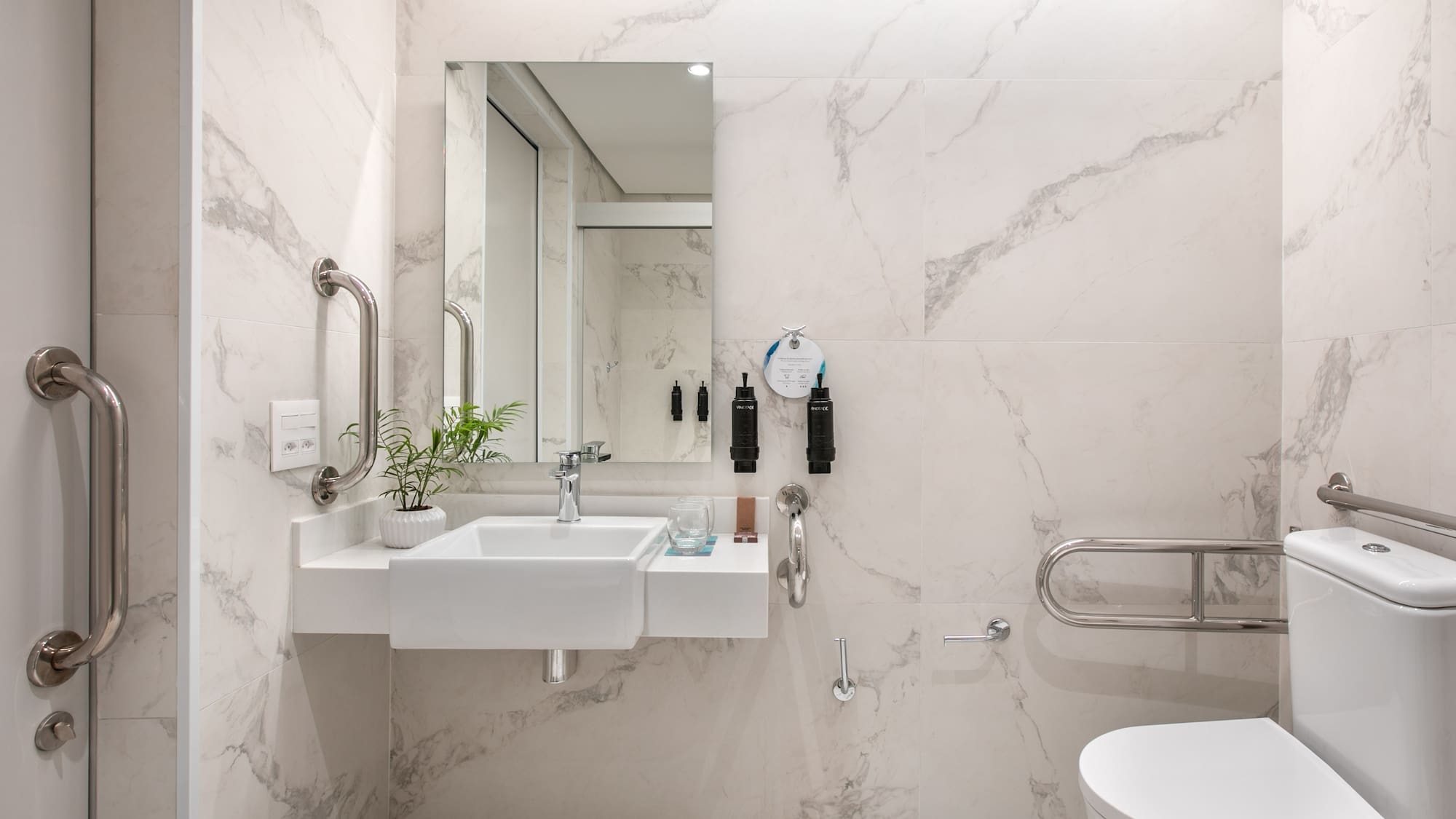 a bathroom with a sink and toilet
