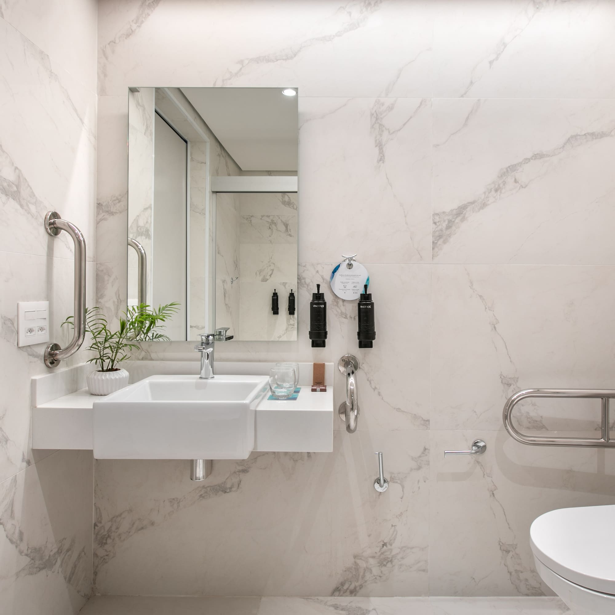 a bathroom with a sink and toilet
