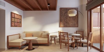a room with a table and chairs