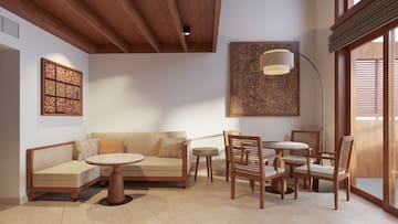 a room with a table and chairs