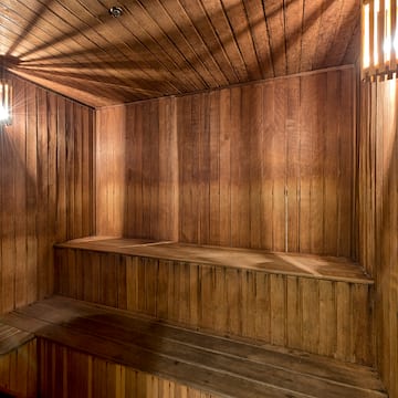 a wooden sauna with lights