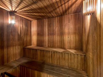 a wooden sauna with lights