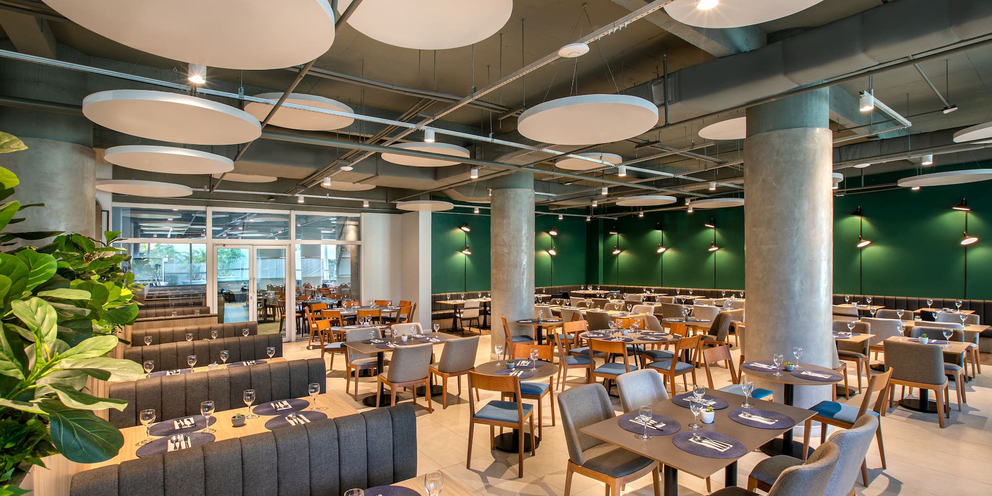 a restaurant with tables and chairs