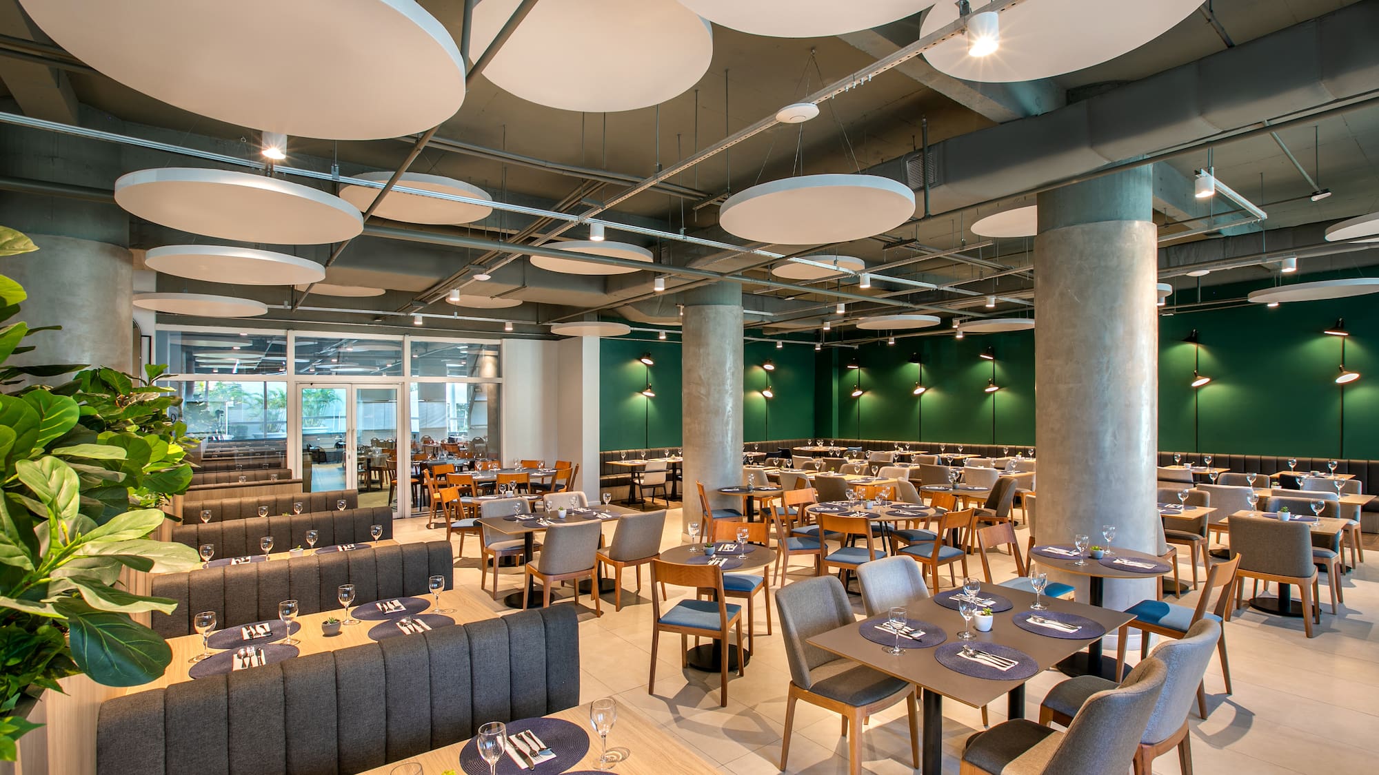 a restaurant with tables and chairs