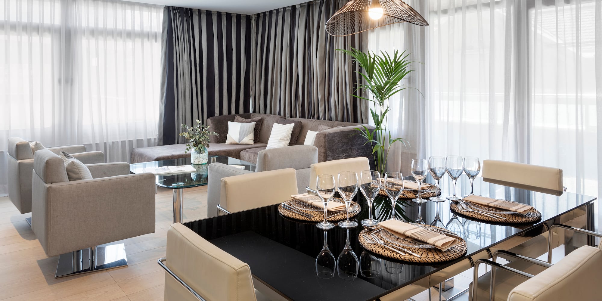 a dining room with a table and chairs