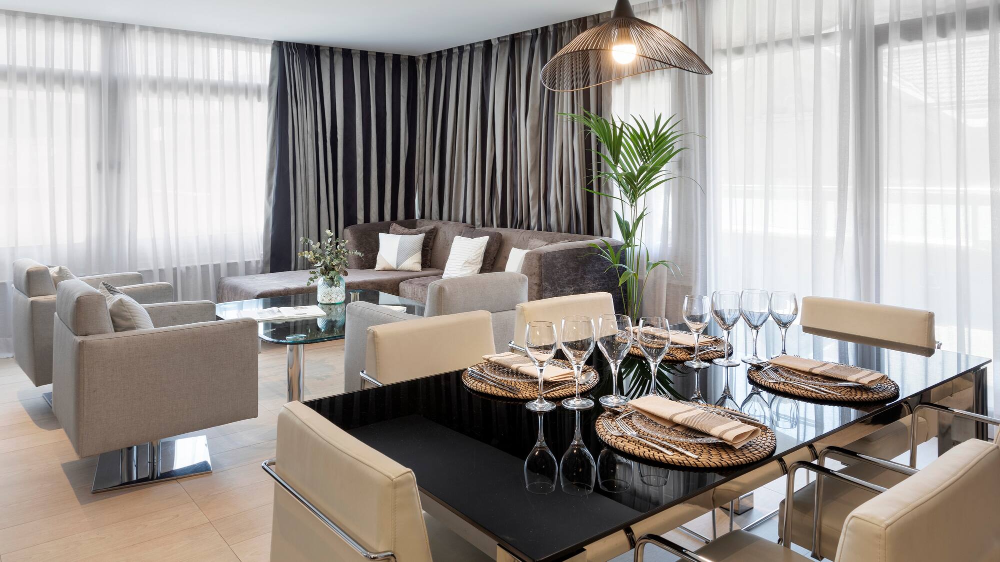 a dining room with a table and chairs