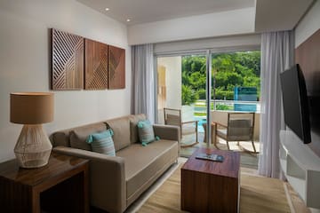 a living room with a couch and a table