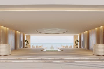 a large room with a fountain and a pool