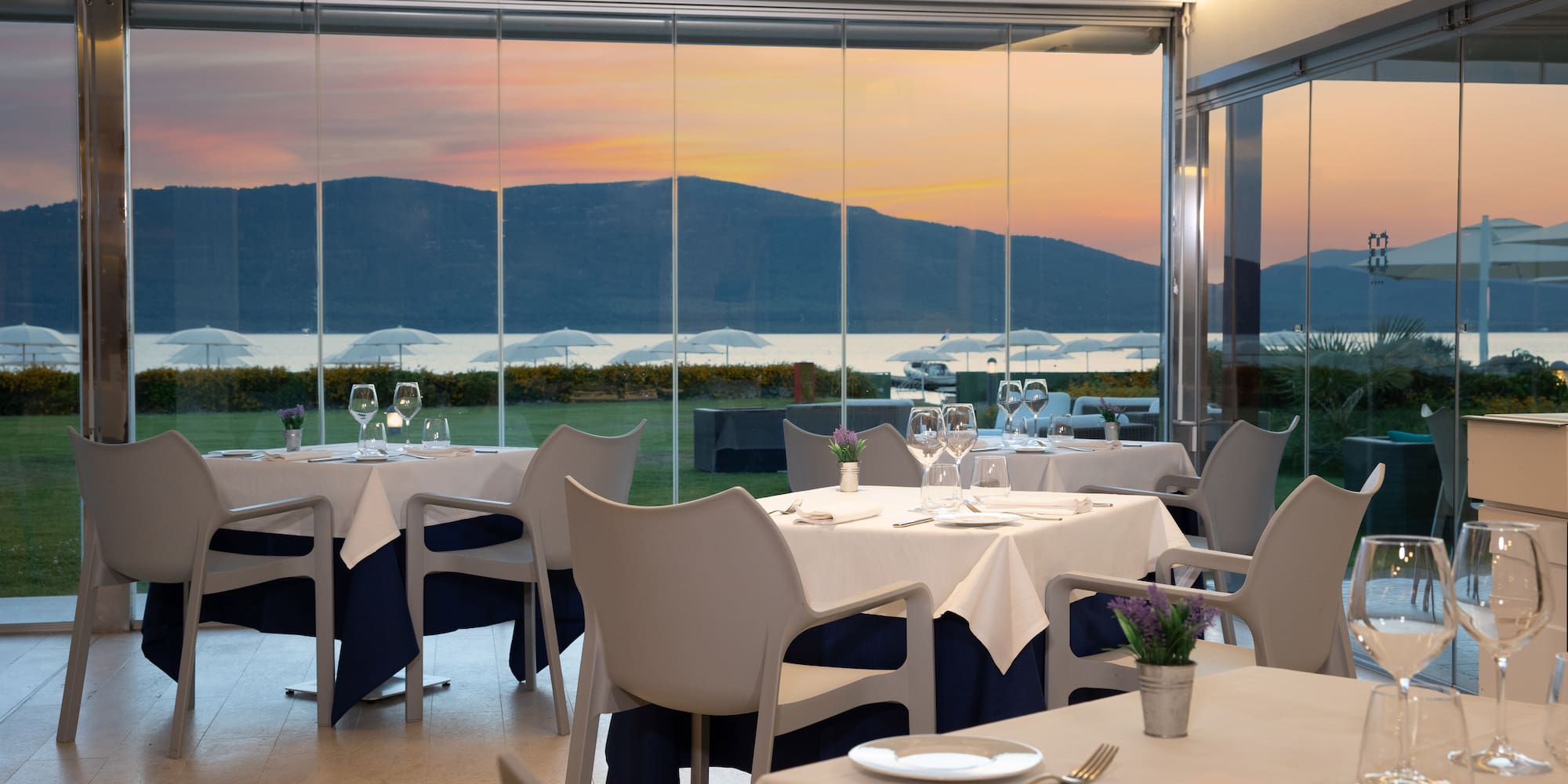 a restaurant with tables and chairs