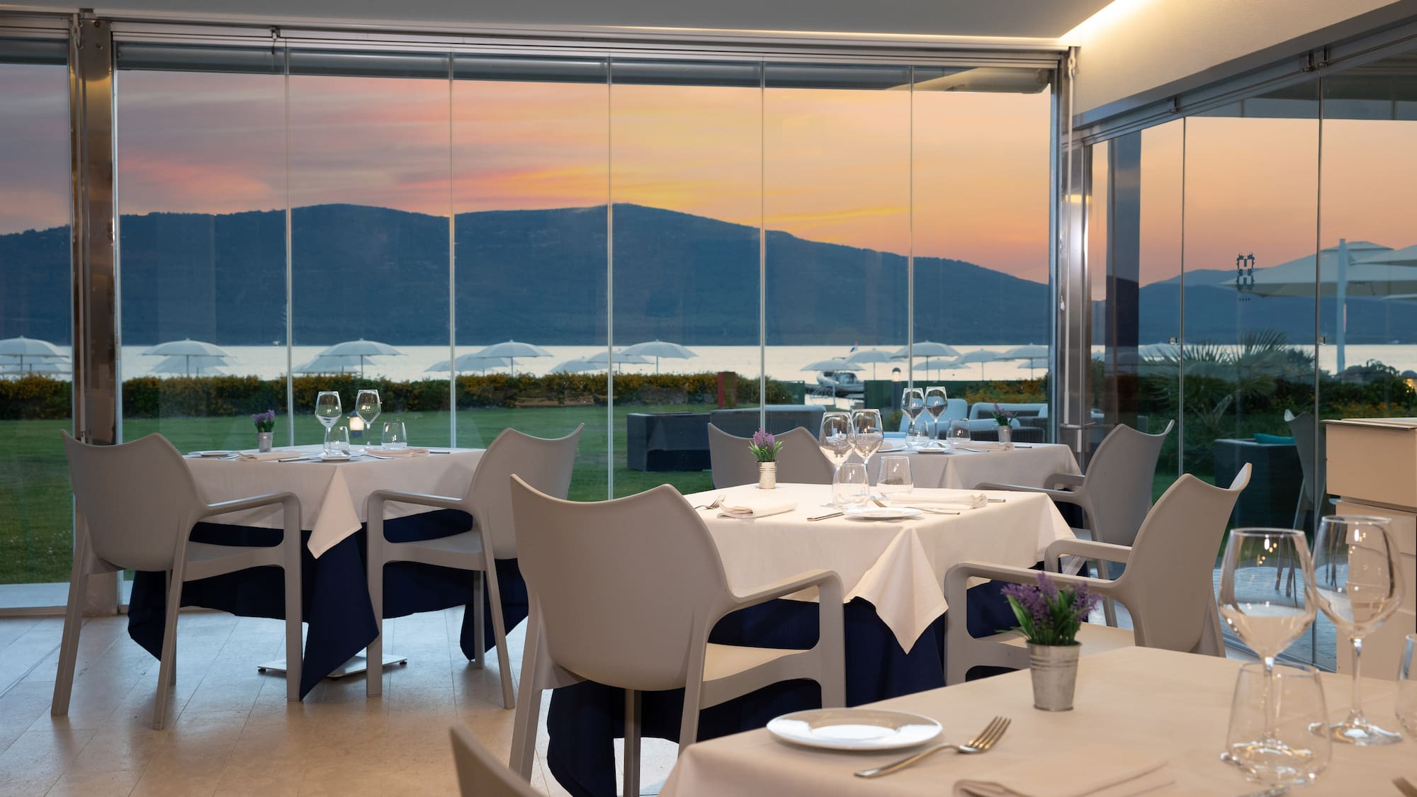 a restaurant with tables and chairs