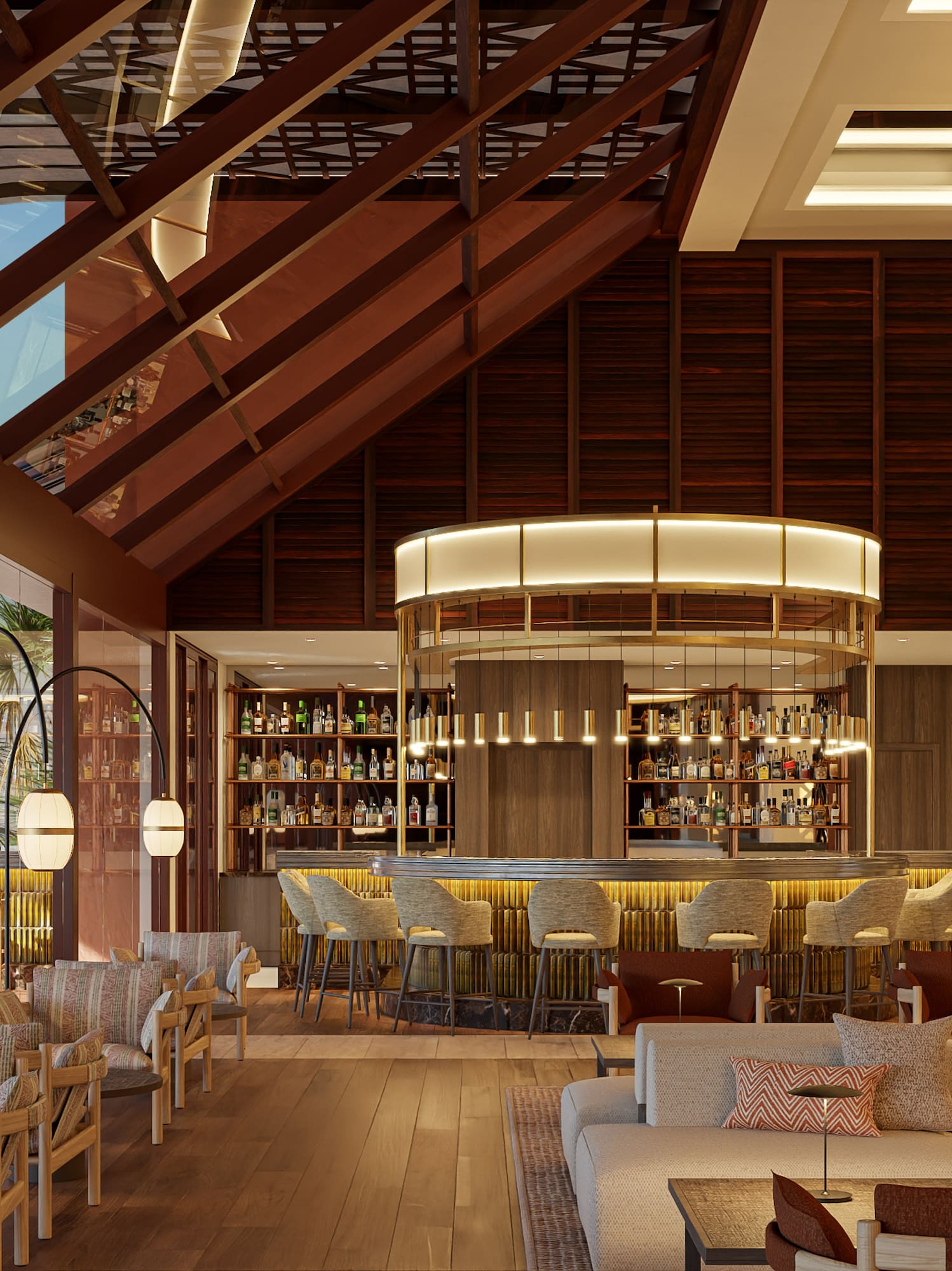 a room with a bar and a lounge area