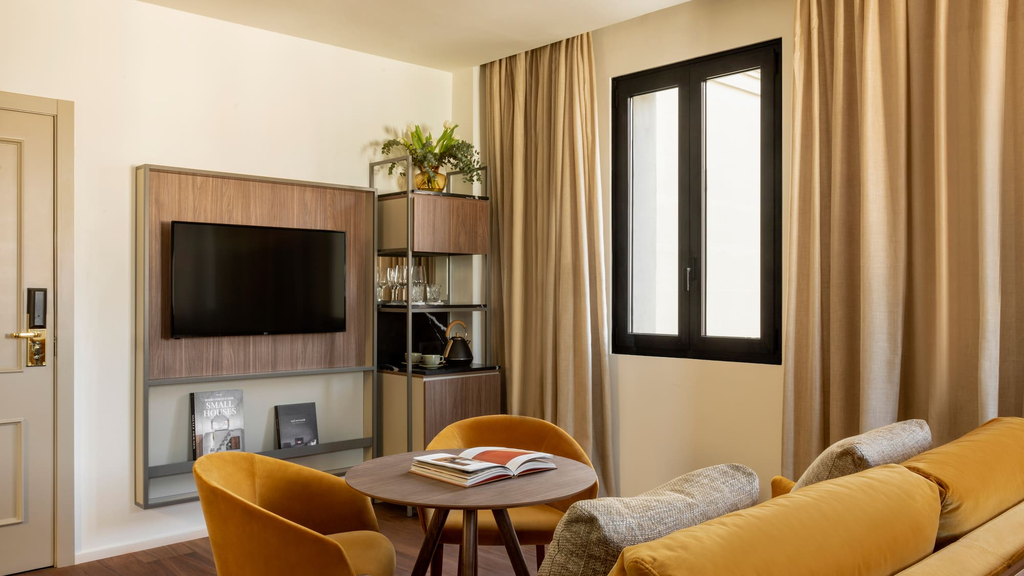 a living room with a tv and a table