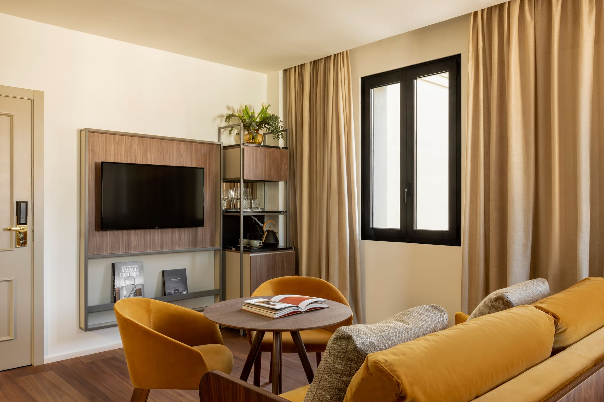 a living room with a tv and a table