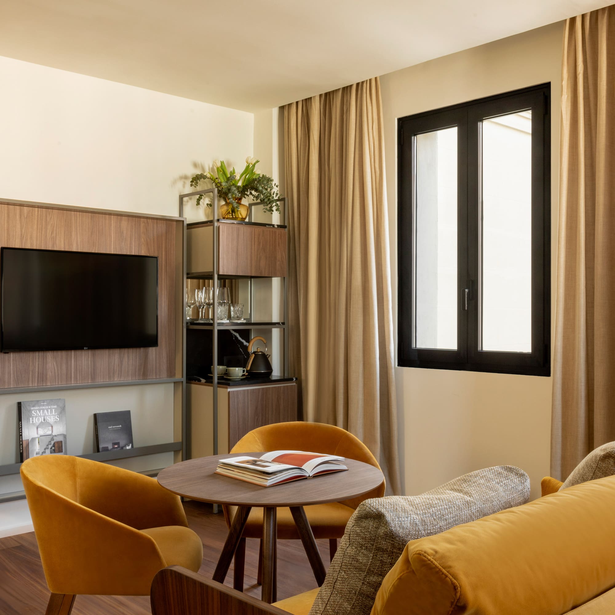 a living room with a tv and a table