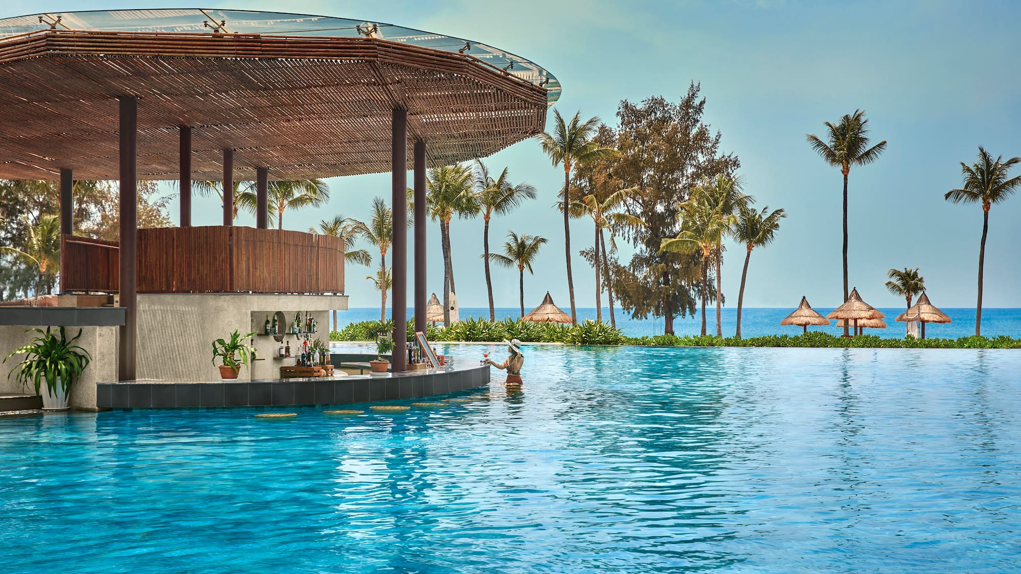 a pool with a bar and a bar on the side