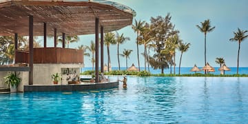 a pool with a bar and a bar on the side