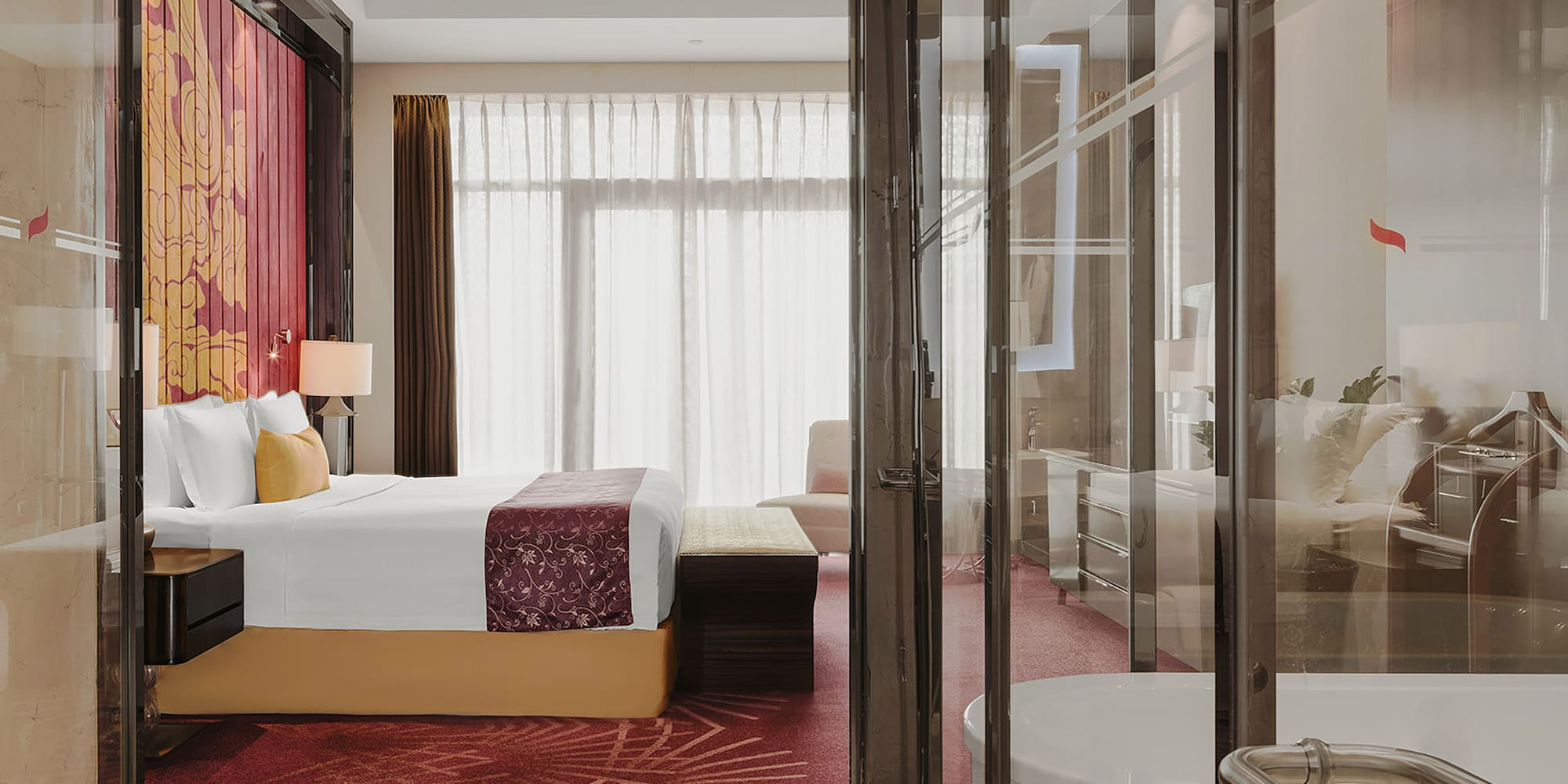 a bedroom with glass doors